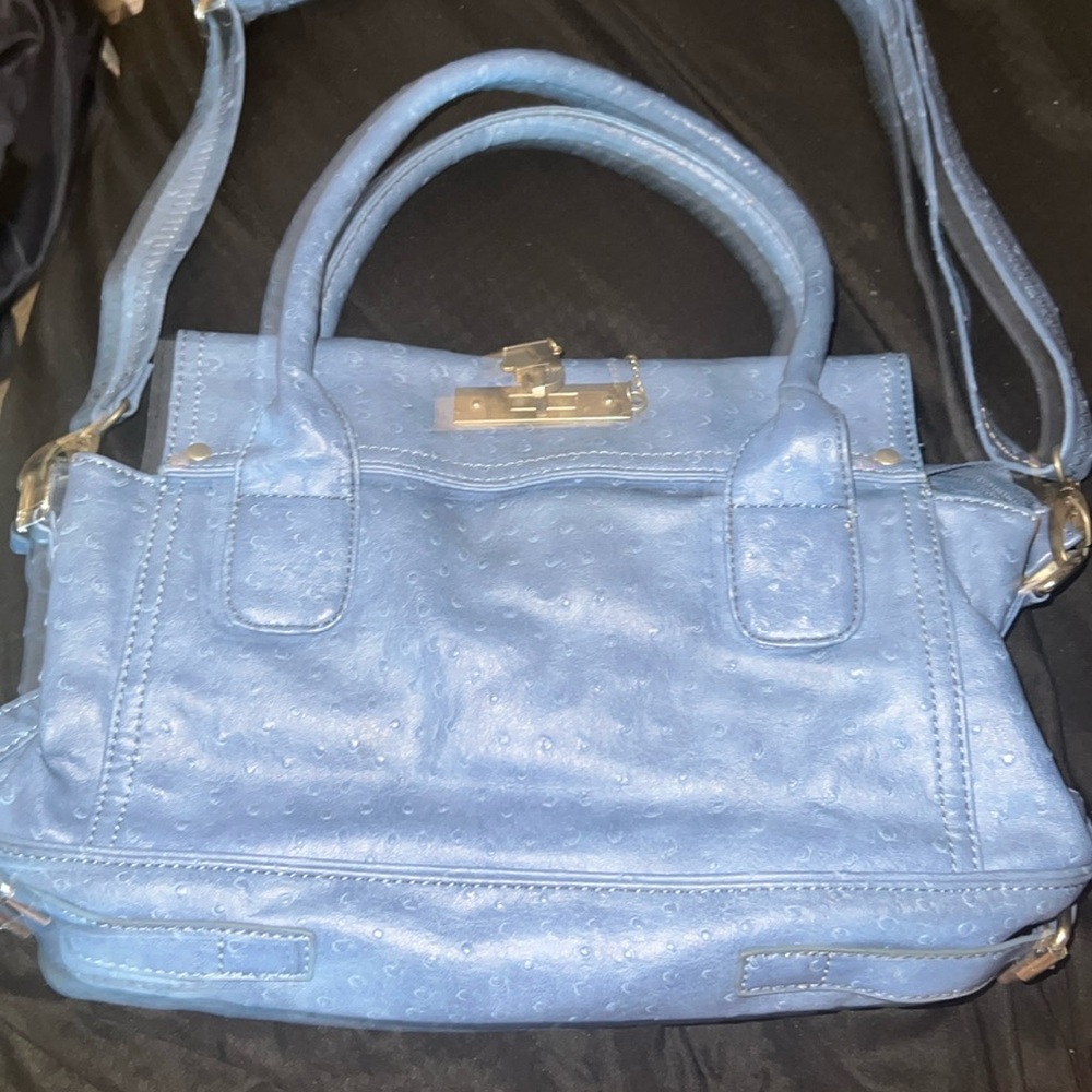 Blue handbag with dark silver accents very light used
